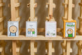 Joking Hazard Deck Enhancement #1 cards displayed on a wooden shelf